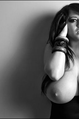 212382 02big 256x388 - Busty boob model Leanne Crow exposing her massive hooters in black and white pictures